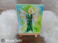 Mini-Engel auf Staffelei